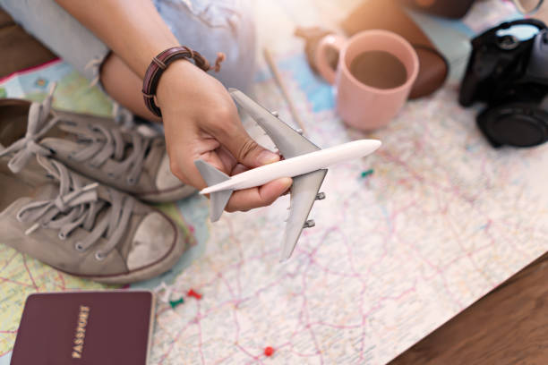 istock Hand to planning vacation trip and accessories for travel 1146177019