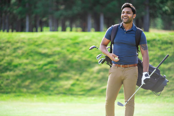 istock Male golfer standing on golf course 1146177665