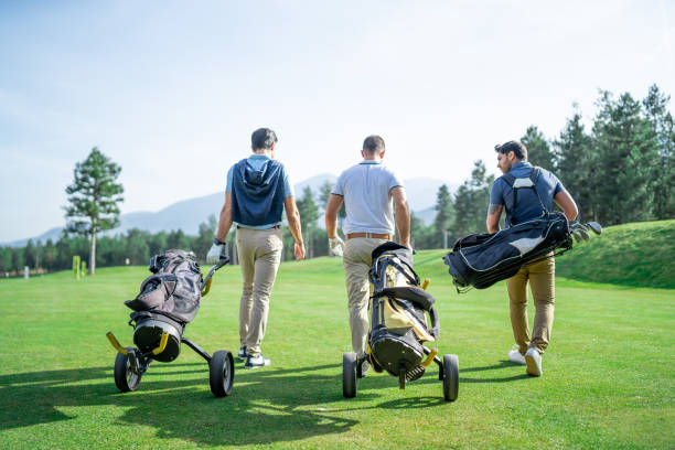istock Friends Playing Golf on a Beautiful Sunny Day 1146178578