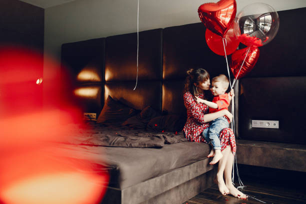 istock Elegant mother with little son in a bed 1146181011