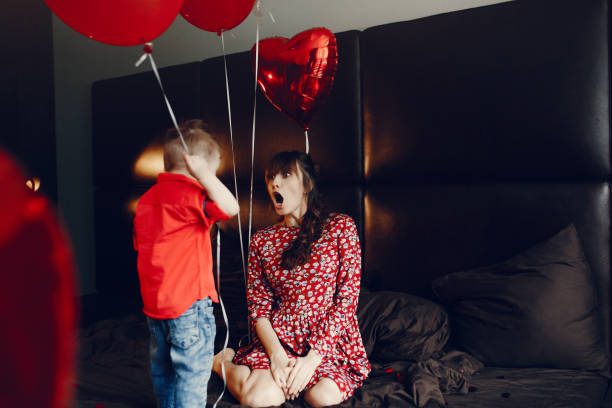 istock Elegant mother with little son in a bed 1146184942
