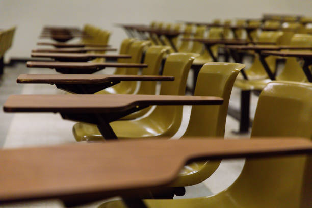 istock Close-up of classroom seats in lecture hall 1146185955