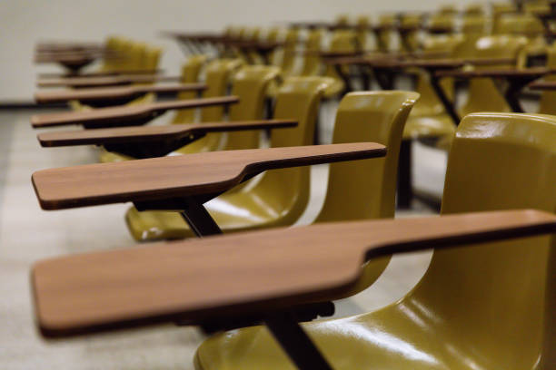istock Close-up of classroom seats in lecture hall 1146185996