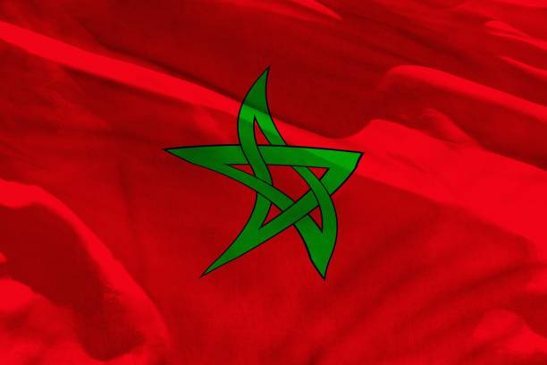 istock Waving Morocco flag for using as texture or background, the flag is fluttering on the wind 1146188173