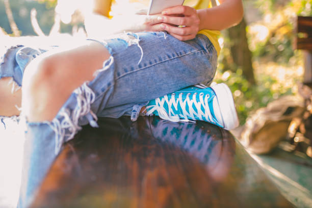 istock Attractive young woman sitting on a river 1146188852