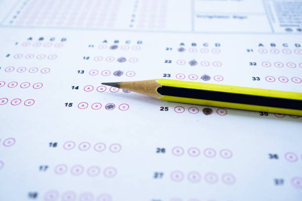 istock Answer sheets with Pencil drawing fill to select choice : education concept 1146192864