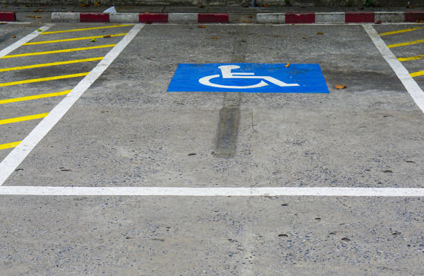 istock Blue Handicap at parking car sign outdoors for Disabled, Wheelchair or elder old or cannot self help people 1146194157
