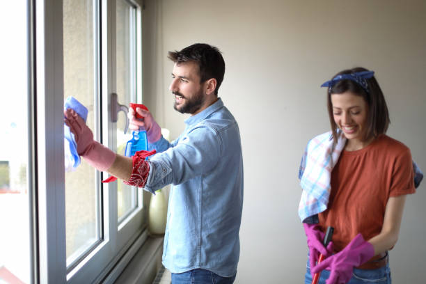istock Beautiful young married couple cleaning apartment 1146194914