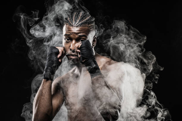 istock Black fight sport athlete shadow boxing 1146195304
