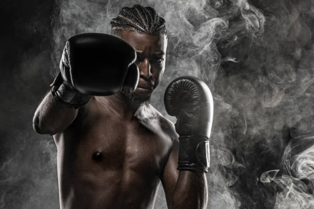 istock Black fight sport athlete shadow boxing 1146196190