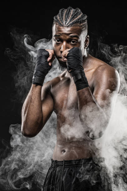 istock Black fight sport athlete shadow boxing 1146196347