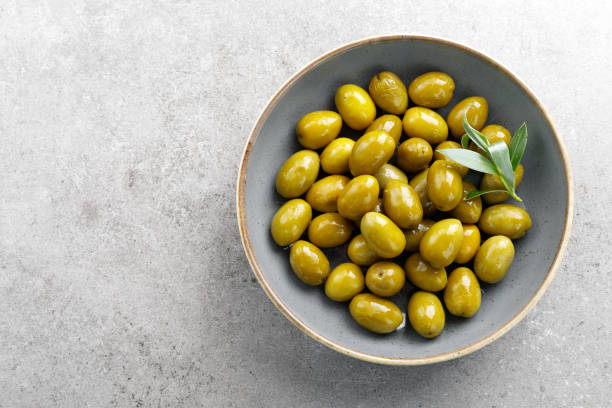 istock Green olives in a bowl 1146199049