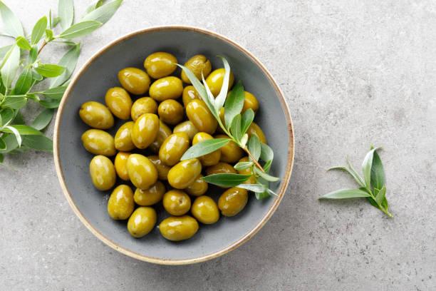 istock Green olives in a bowl 1146199116