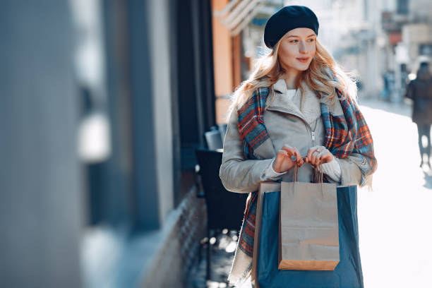 istock Elegant cute blonde walking in a city 1146200018