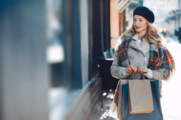 istock Elegant cute blonde walking in a city 1146200270