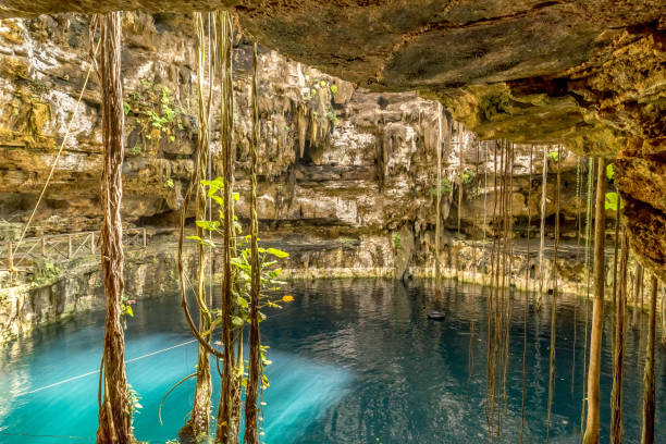 Cenote at San Lorenzo Oxman. Valladolid Cenotes. Yucatan Peninsula. Mexico Cenote at San Lorenzo Oxman. Valladolid Cenotes. Yucatan Peninsula. Mexico, America valladolid mexico photos stock pictures, royalty-free photos & images