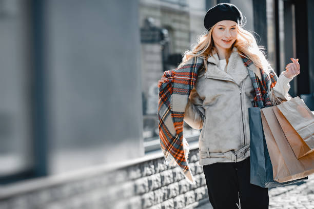 istock Elegant cute blonde walking in a city 1146203219