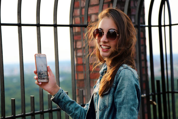 istock Beautiful woman Taking Photos 1146209801