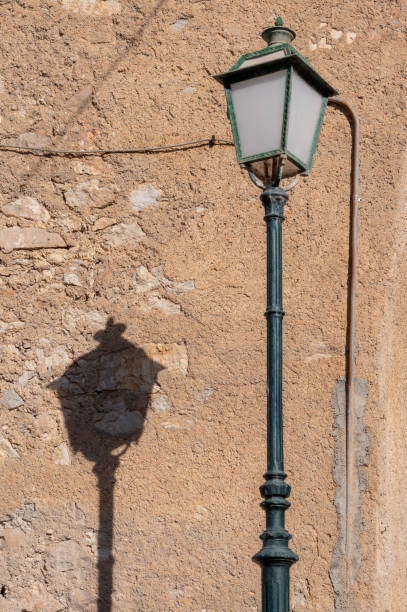 istock Low Angle View Of Street Light Against Wall 1146212195