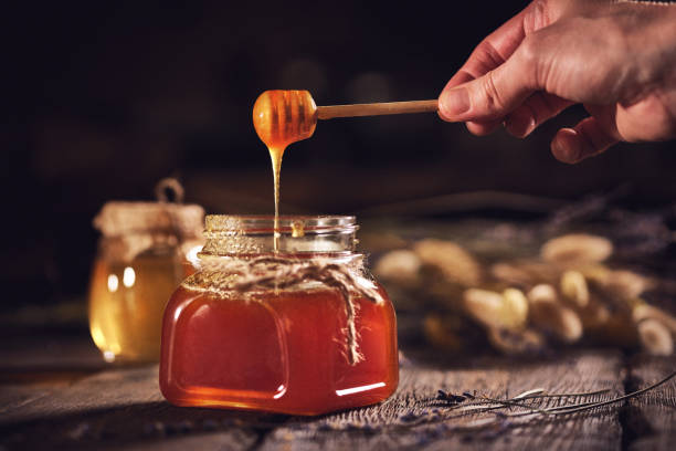 istock Organic honey products on wooden table 1146215358