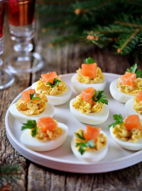 istock Stuffed chicken eggs with soft cheese, capers and salted salmon. 1146217370