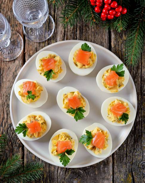 istock Stuffed chicken eggs with soft cheese, capers and salted salmon. 1146217383