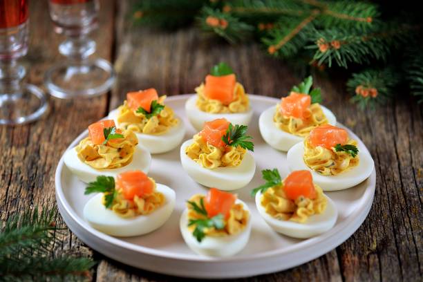 istock Stuffed chicken eggs with soft cheese, capers and salted salmon. 1146217384