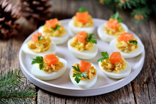istock Stuffed chicken eggs with soft cheese, capers and salted salmon. 1146217404