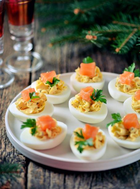 istock Stuffed chicken eggs with soft cheese, capers and salted salmon. 1146217407