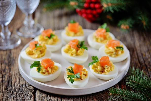 istock Stuffed chicken eggs with soft cheese, capers and salted salmon. 1146217432
