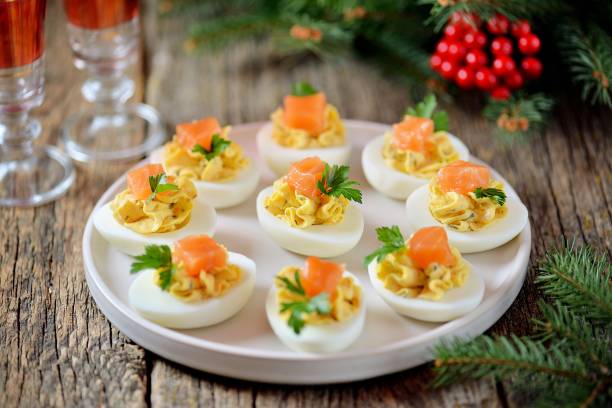 istock Stuffed chicken eggs with soft cheese, capers and salted salmon. 1146217462