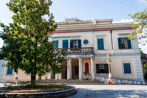 Mon Repos palace in Corfu island, Greece Corfu, Greece - August 26, 2018: Mon Repos palace in Corfu island at Greece corfu holiday palace stock pictures, royalty-free photos & images