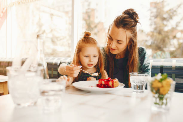 istock stylish mother with daughter 1146220581