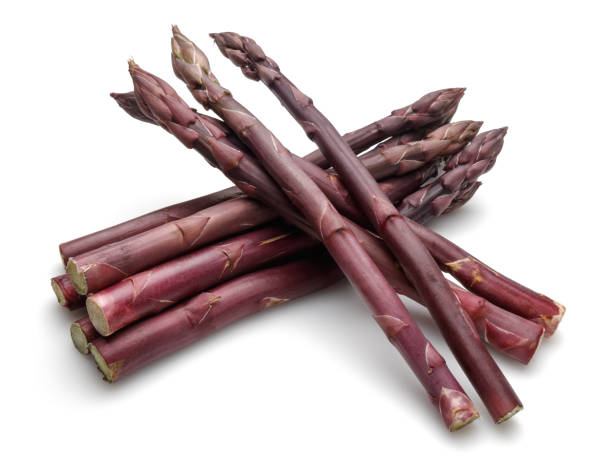 istock Purple asparagus sticks isolated on white 1146220592