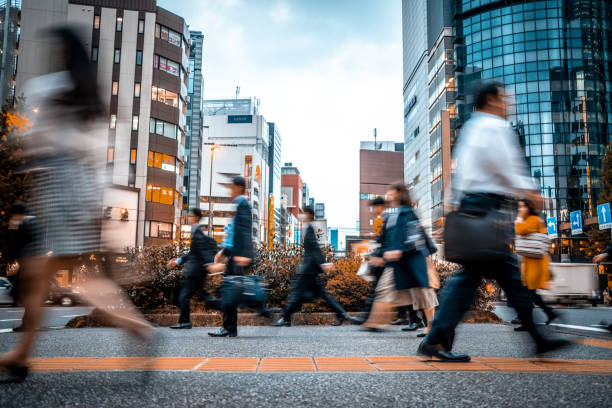 istock Blurred business people on their way from work 1146224405
