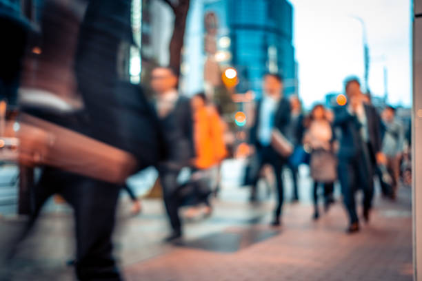 istock Blurred business people on their way from work 1146224409