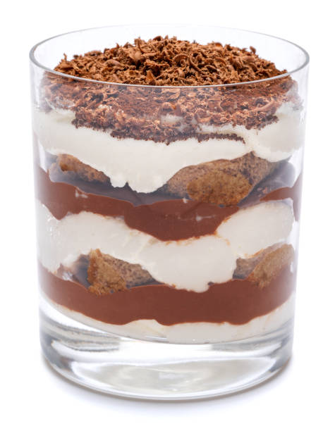 Classic tiramisu dessert in a glass isolated on a white background with clipping path