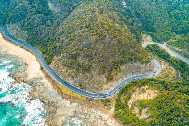istock Vehicles driving on Great Ocean Road - aerial view 1146229159