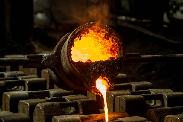 istock metal casting process with red high temperature fire in metal part factory 1146231225