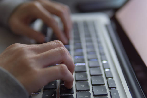 istock Freelancer typing on laptop at home 1146233292