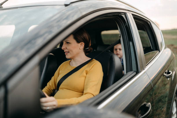 istock Mother driving her son to home 1146233907