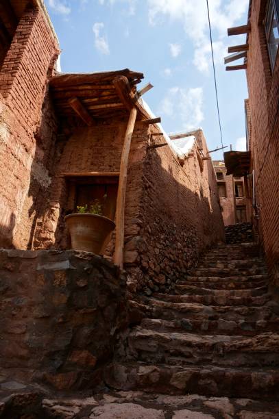 istock Cobbled stairs in a mud brick alleyway 1146236529