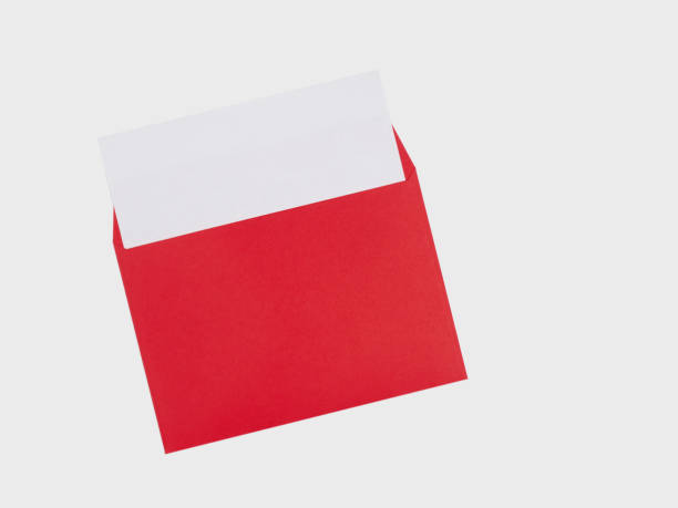 istock Red envelope with a white sheet of paper on a white background 1146238947