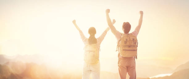 istock Couple looks at sunset. 1146241451