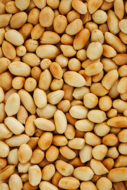 istock Peanut texture. food background of peanuts beans. 1146241601