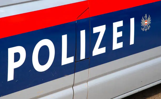 Close-up car door lettering police austria