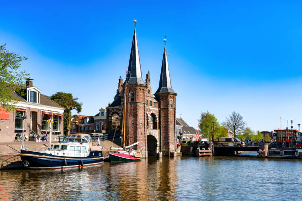 The famous Waterpoort Gate in Sneek, Friesland, the Netherlands The harbor and boats in Sneek, Sneek is the main village in sailing history in Netherlands friesland netherlands stock pictures, royalty-free photos & images