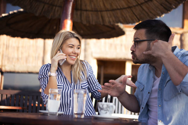 istock A handsome young man is angry at his beautiful girlfriend blonde 1146242848