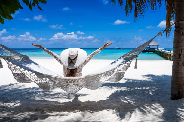 istock Woman on a hammock in the Maldives 1146243910