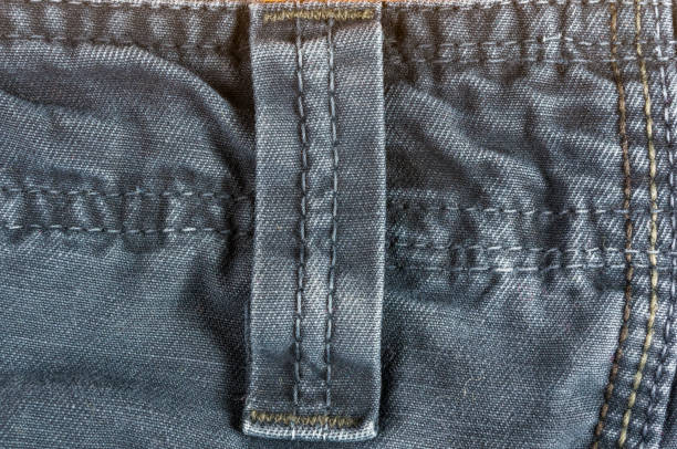 istock clothing items washed cotton fabric texture with seams 1146244335